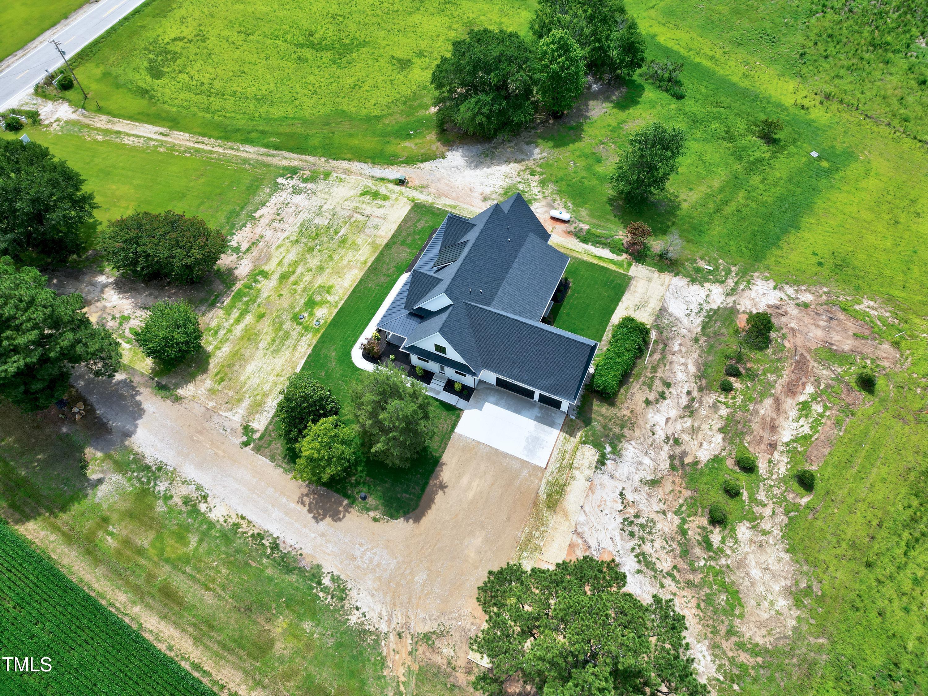 6509 Zebulon Road Wake Forest, NC 27587 - Photo 92 of 100 an aerial view of a house with a yard