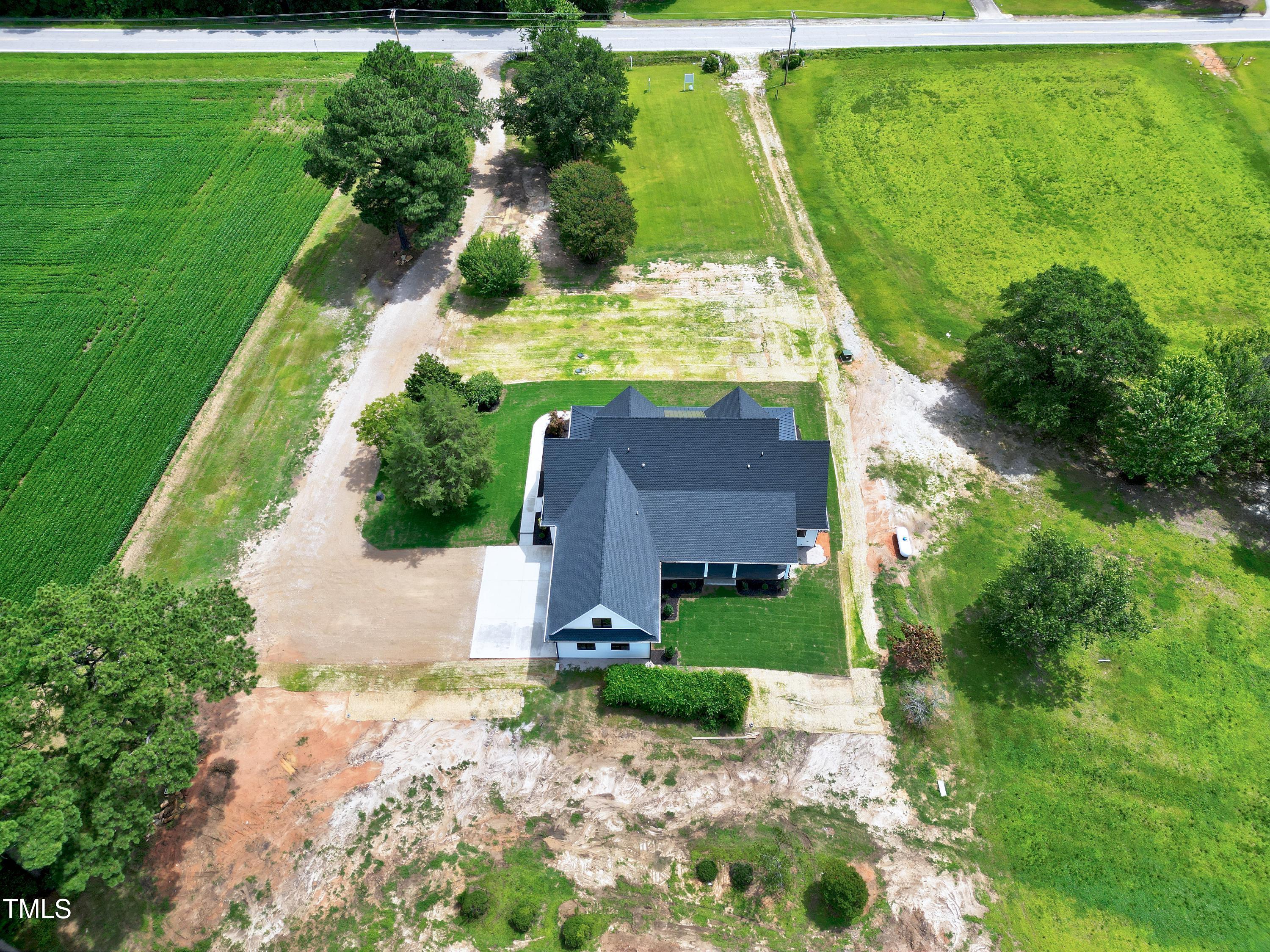 6509 Zebulon Road Wake Forest, NC 27587 - Photo 93 of 100 a view of a back yard of the house