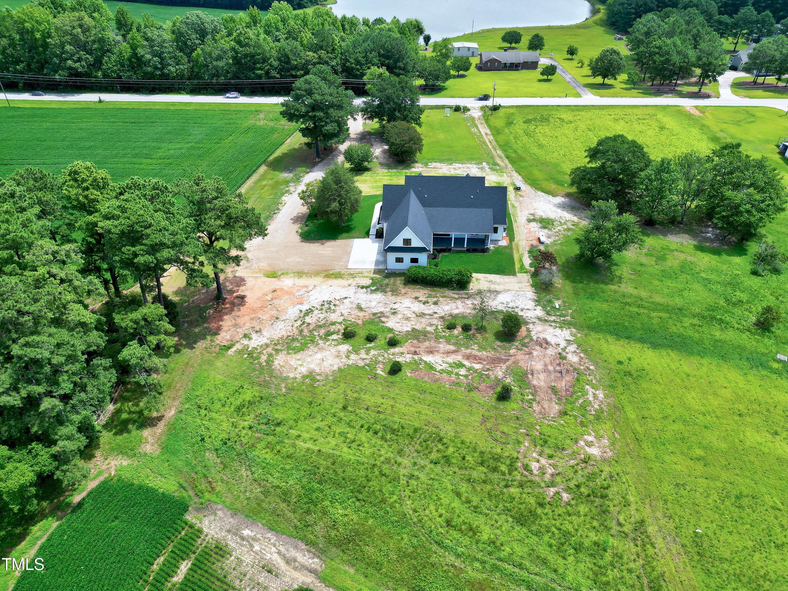 6509 Zebulon Road Wake Forest, NC 27587 - Photo 98 of 100 a view of a garden with a fountain