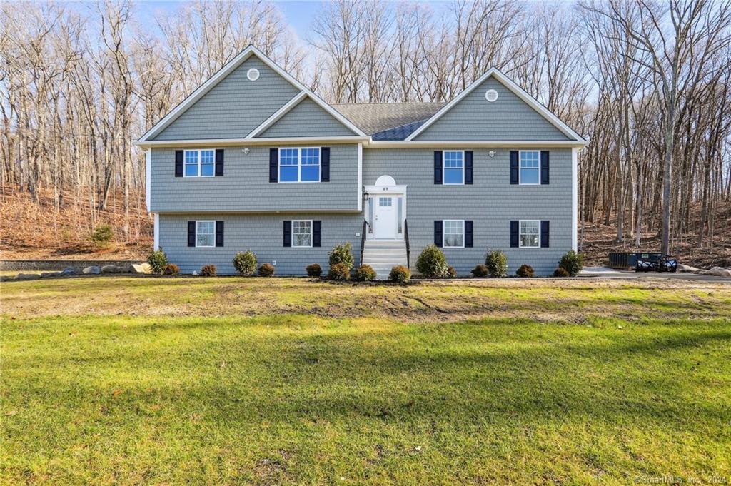 49 Shelley Road Bethel, CT 06801 - Photo 1 of 1 a front view of a house with swimming pool