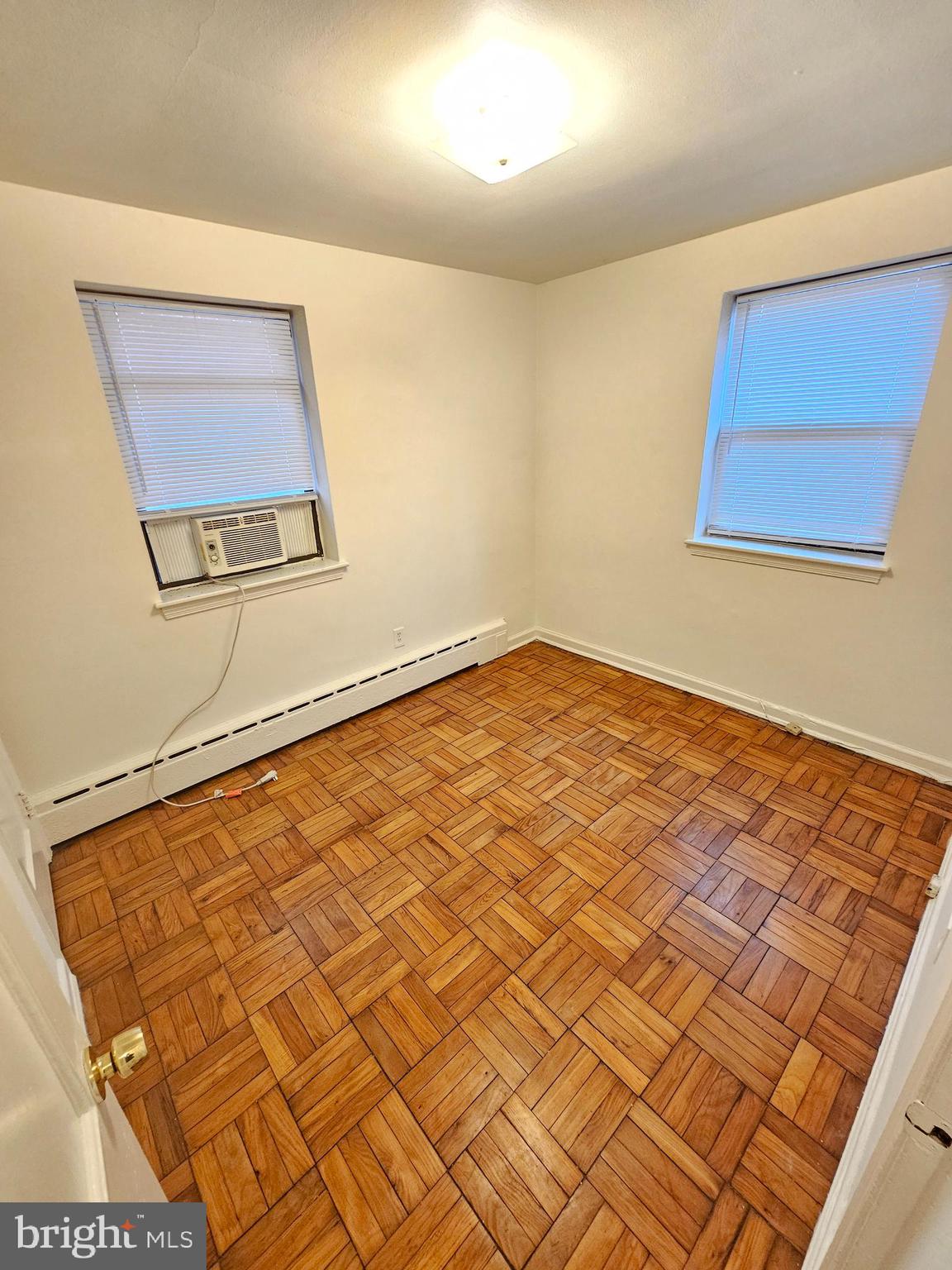 8711 Plymouth Street, Unit 1 Silver Spring, MD 20901 - Photo 14 of 14 a view of a room with a wooden floor