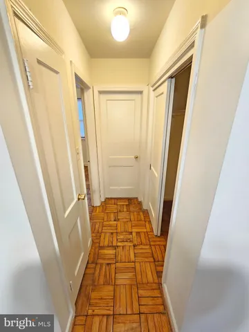 a bathroom with a tub and shower