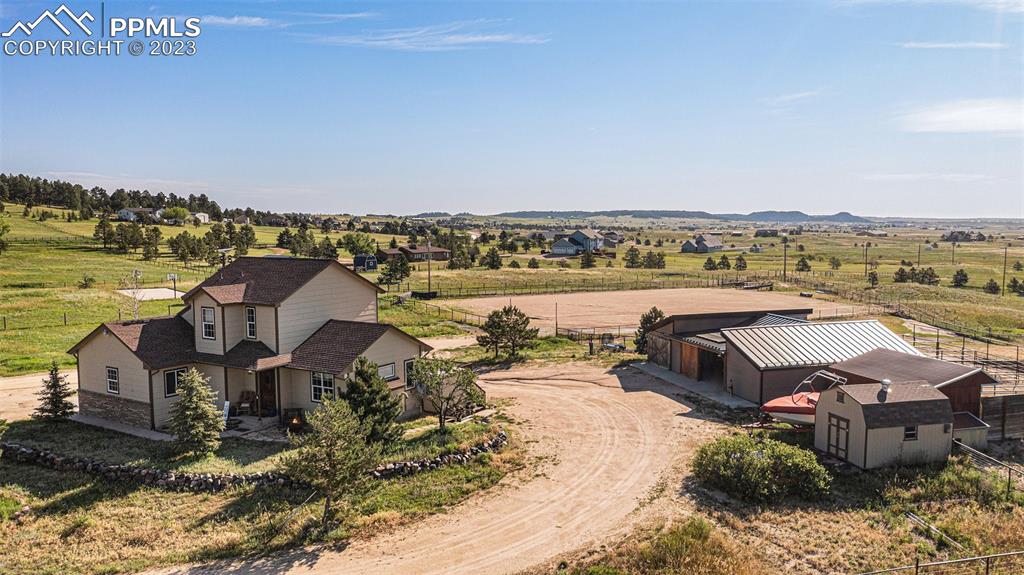 14965 Tanner Trail Elbert, CO 80106 - Photo 11 of 50 a view of a lake with couches and city view