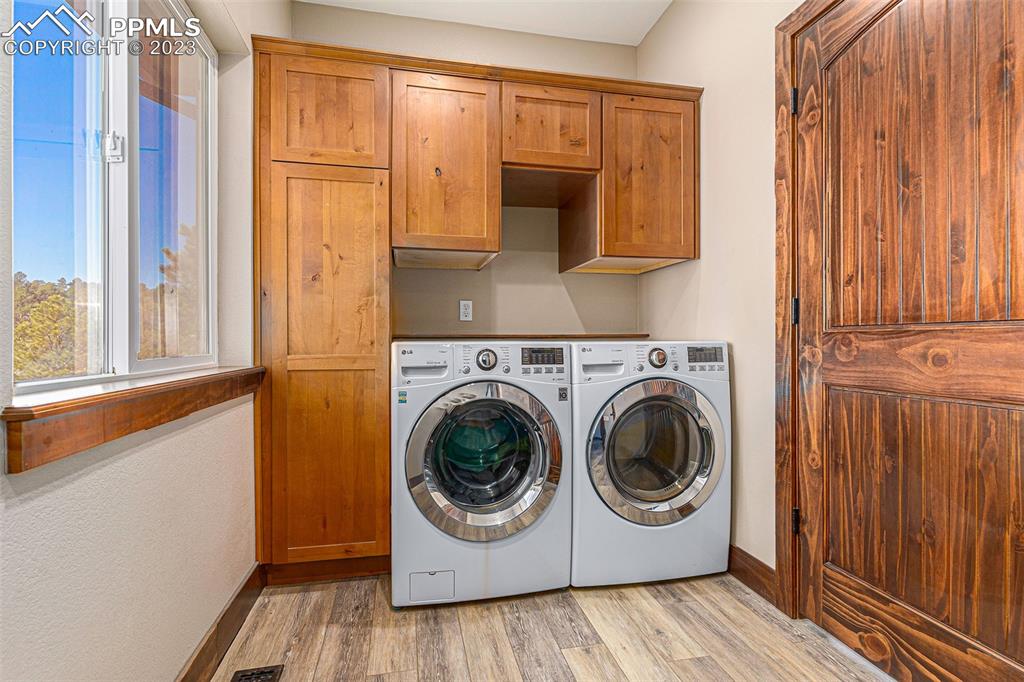 14965 Tanner Trail Elbert, CO 80106 - Photo 25 of 50 a utility room with dryer and washer