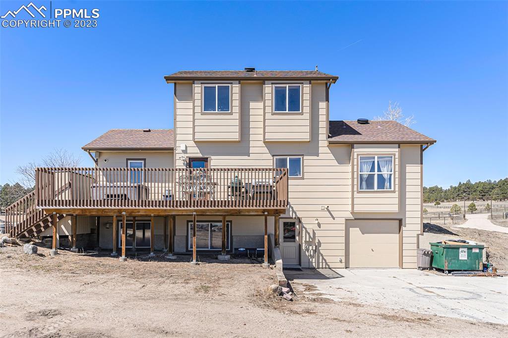 14965 Tanner Trail Elbert, CO 80106 - Photo 38 of 50 a front view of a house with a yard