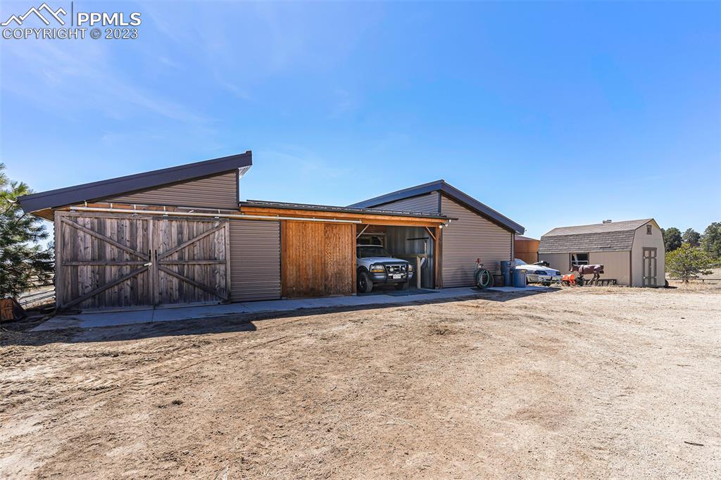 14965 Tanner Trail Elbert, CO 80106 - Photo 42 of 50 a view of a house with a snow in the yard
