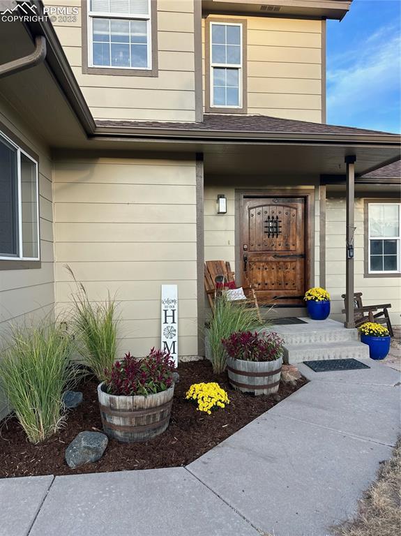 14965 Tanner Trail Elbert, CO 80106 - Photo 10 of 50 a store room with furniture and potted plants