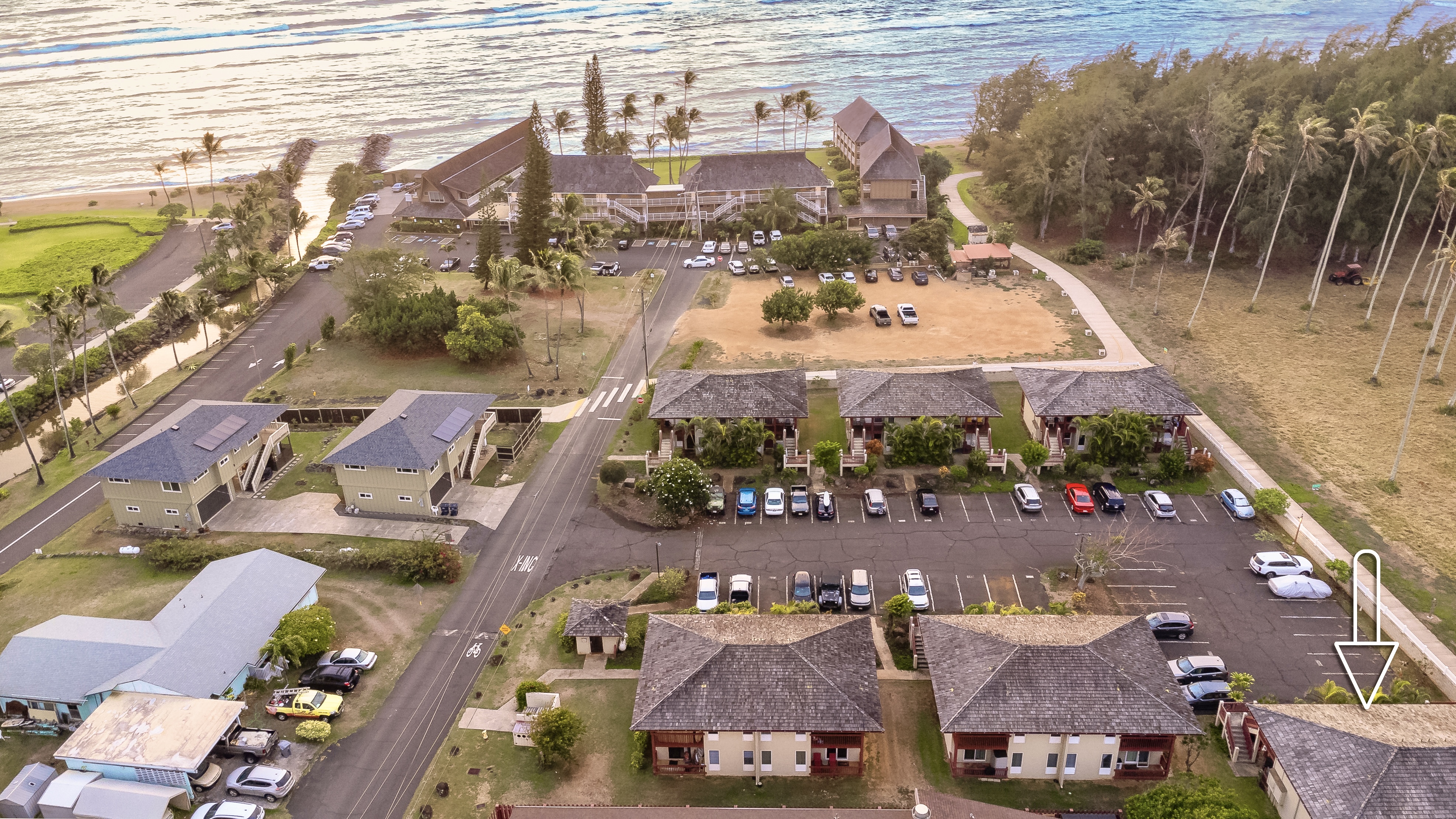 an aerial view of residential houses with outdoor space