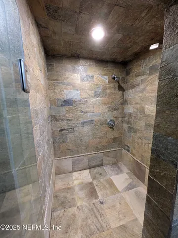 a view of a room with a large window