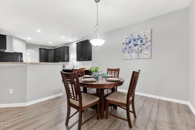 a view of a dining room with furniture