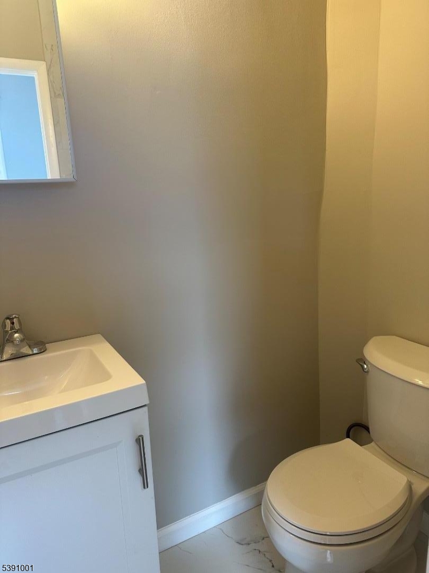 553 Bloomfield Avenue, Unit 2B Montclair, NJ 07042 - Photo 9 of 15 a bathroom with a sink and a toilet