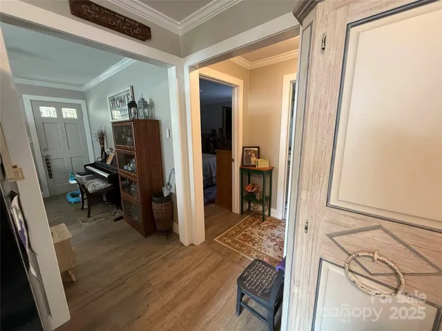 a view of a livingroom with furniture and front door