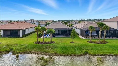 a view of a porch and patio with a garden