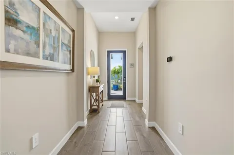 a view of a hallway with a white walls