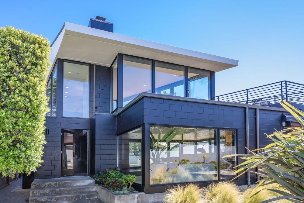 1241 Main Street Montara, CA 94037 - Photo 4 of 34 a front view of a house with a yard