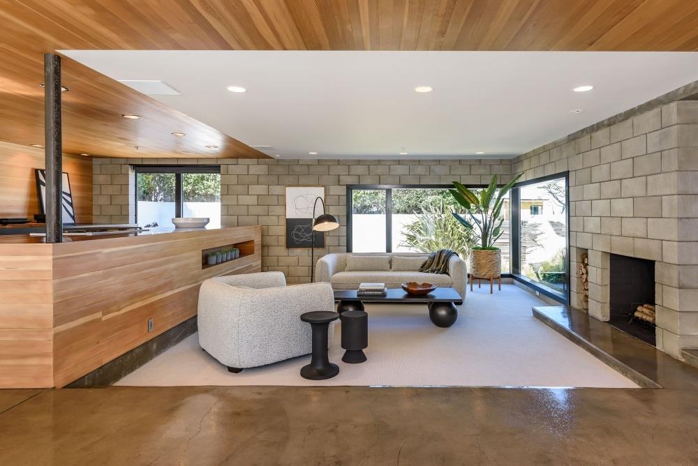 1241 Main Street Montara, CA 94037 - Photo 7 of 34 a living room with furniture and a fireplace