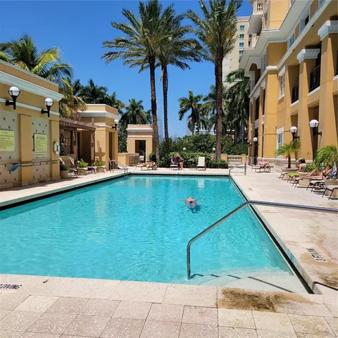 a view of a patio with swimming pool