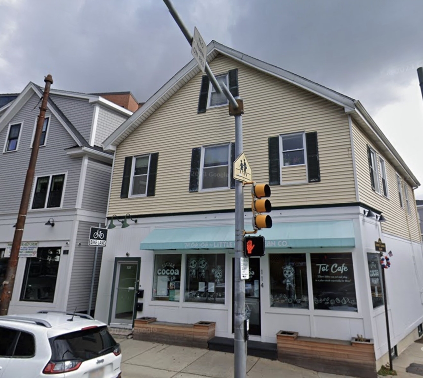 112 South Street, Unit 2 Boston, MA 02130 - Photo 7 of 8 a view of a white building among the street