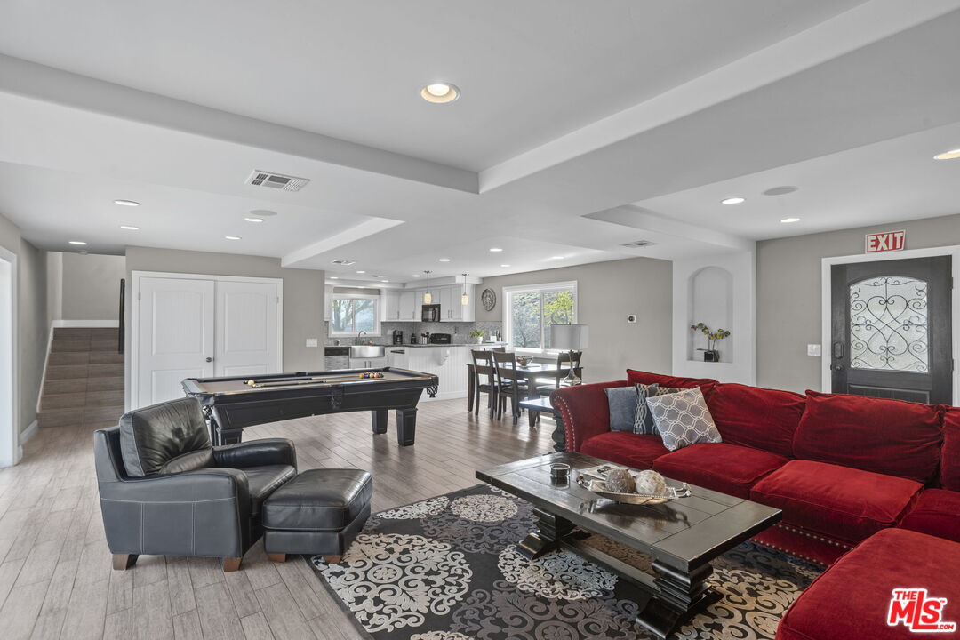 36880 East Benton Road Temecula, CA 92592 - Photo 12 of 75 a living room with furniture and kitchen view