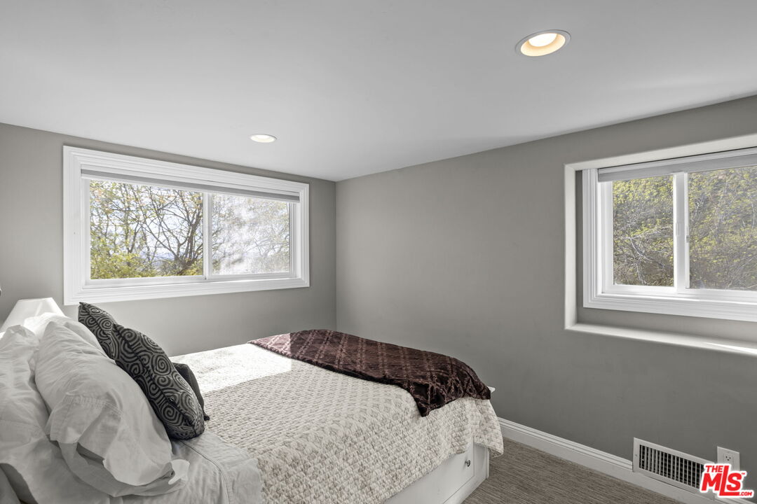 36880 East Benton Road Temecula, CA 92592 - Photo 18 of 75 a bedroom with a bed and a window