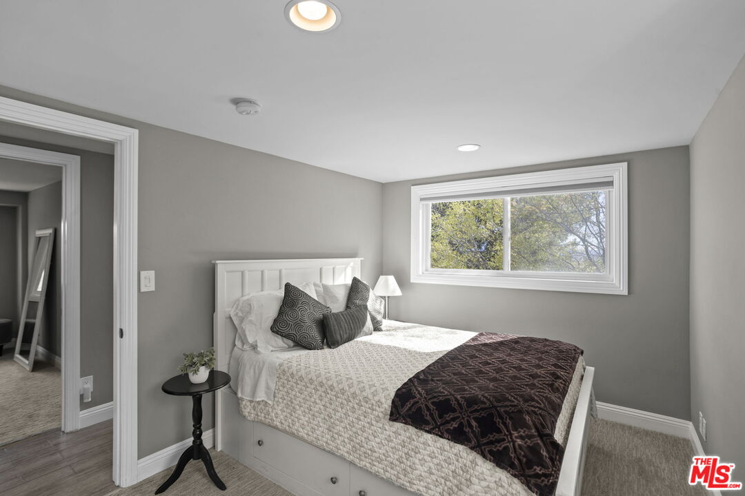 36880 East Benton Road Temecula, CA 92592 - Photo 19 of 75 a bedroom with a bed and a window