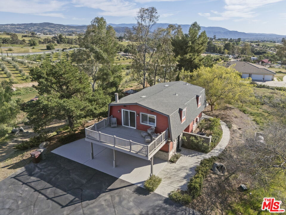 36880 East Benton Road Temecula, CA 92592 - Photo 35 of 75 a view of a house with a yard
