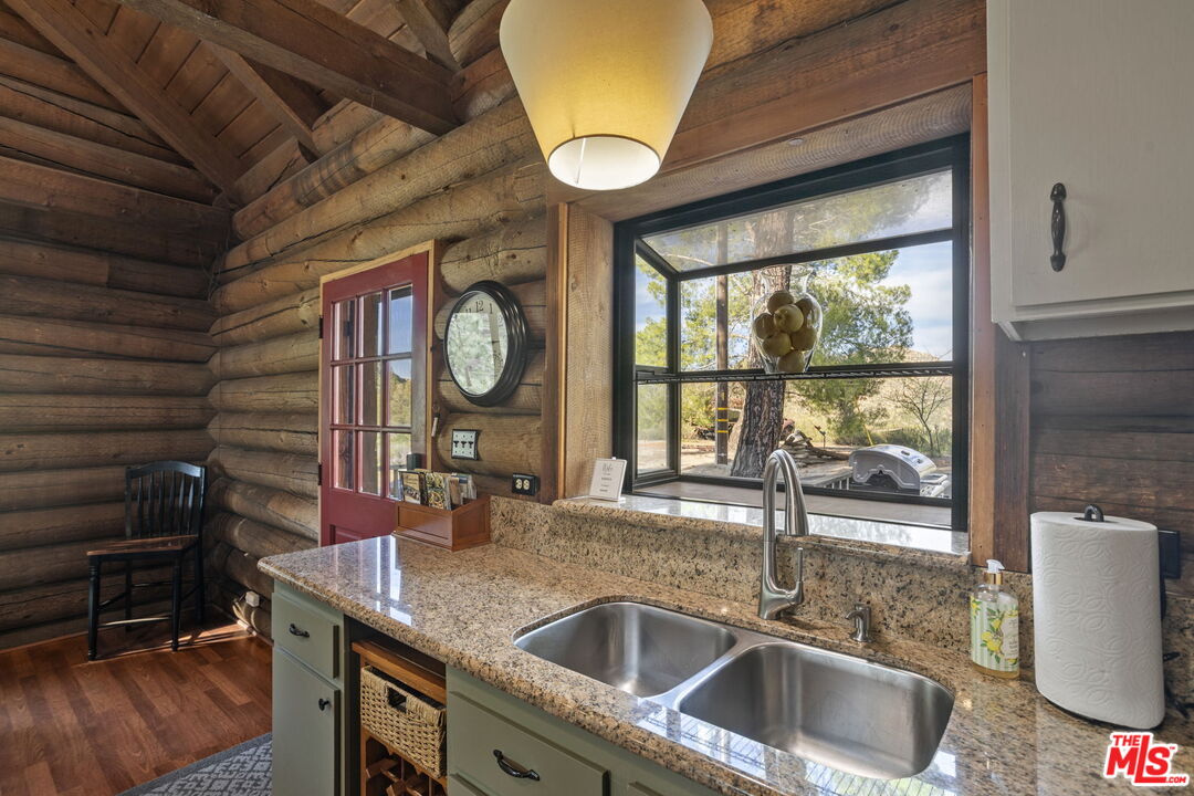 36880 East Benton Road Temecula, CA 92592 - Photo 48 of 75 a kitchen with a sink and a window