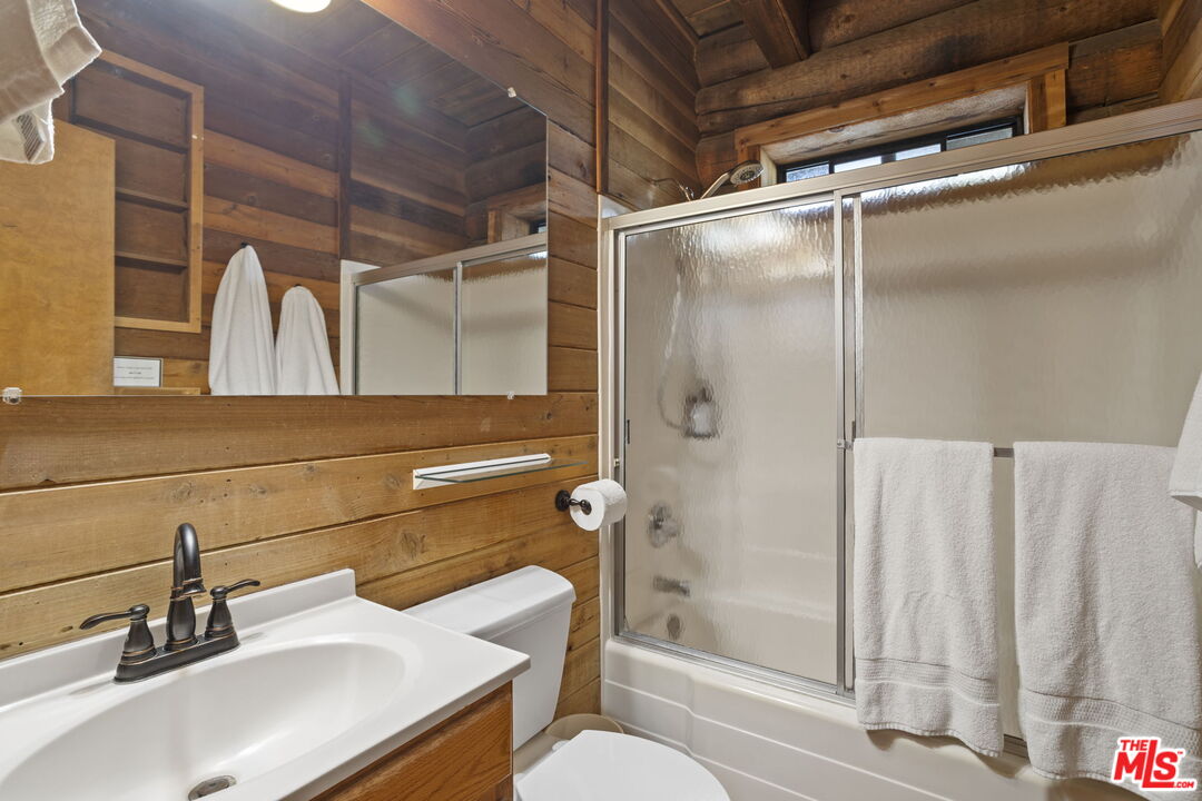 36880 East Benton Road Temecula, CA 92592 - Photo 56 of 75 a bathroom with a sink toilet and shower