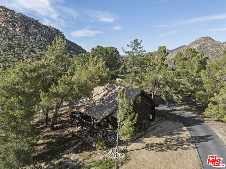 36880 East Benton Road Temecula, CA 92592 - Photo 63 of 75 a view of a yard with a tree