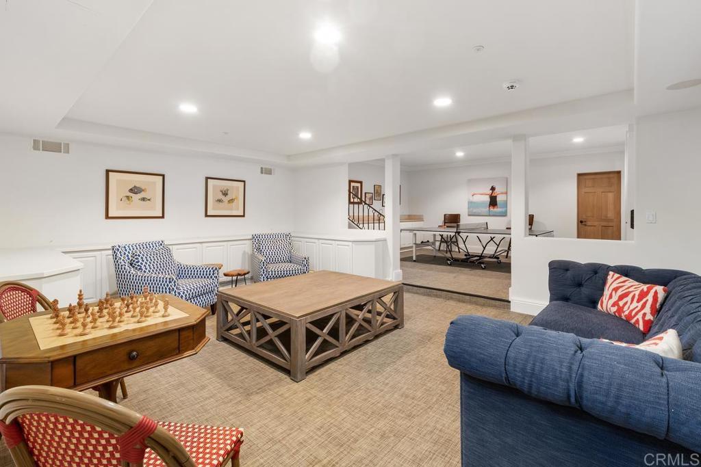 5315 La Crescenta Road Rancho Santa Fe, CA 92067 - Photo 12 of 17 a living room with furniture and a table