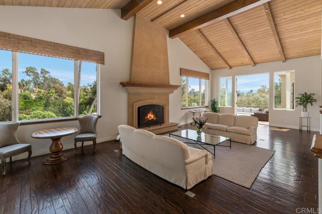 5315 La Crescenta Road Rancho Santa Fe, CA 92067 - Photo 3 of 17 a living room with furniture and a fireplace