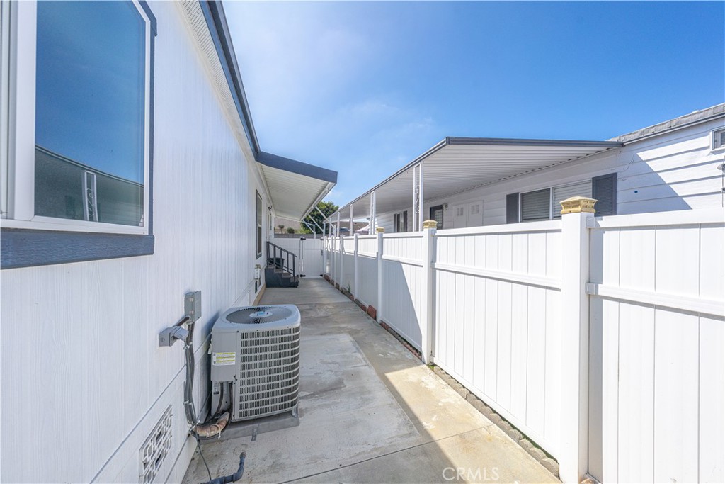 209 Rd Runner Lane Fountain Valley, CA 92708 - Photo 32 of 38 a view of a hallway with furniture