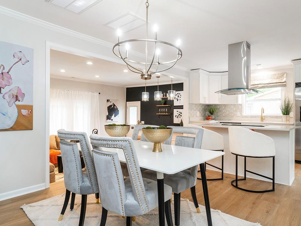 1720 Elder Way Burlington, NC 27215 - Photo 15 of 34 a view of kitchen with dining table and chairs