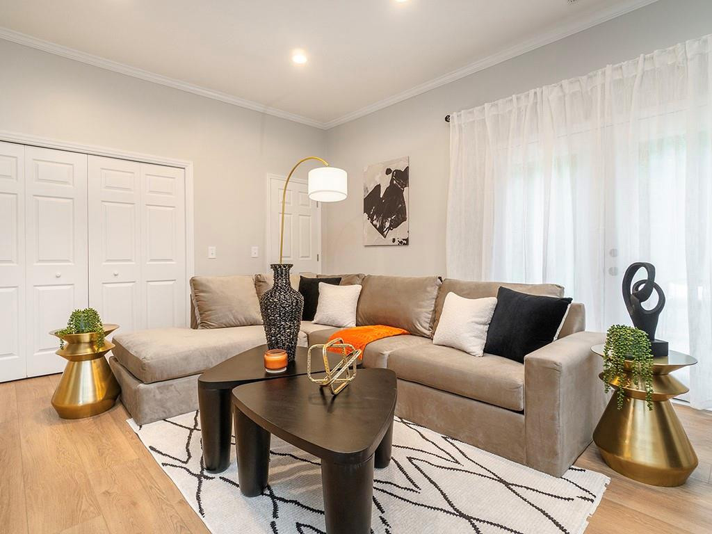 1720 Elder Way Burlington, NC 27215 - Photo 16 of 34 a living room with furniture and wooden floor