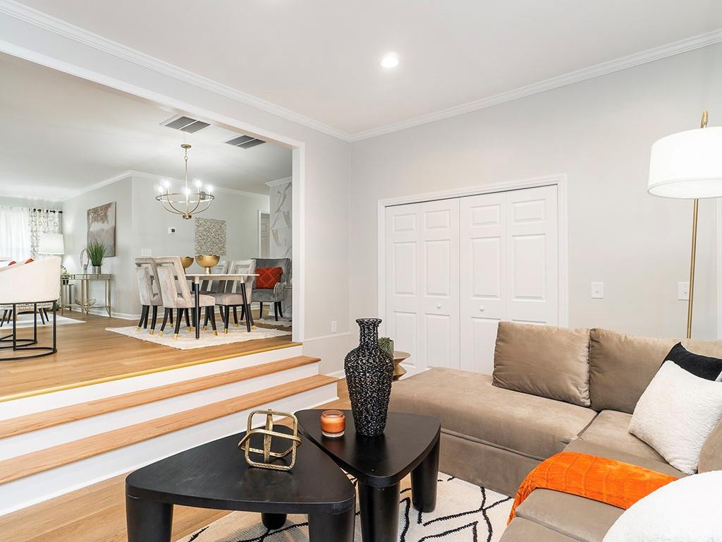 1720 Elder Way Burlington, NC 27215 - Photo 17 of 34 a living room with furniture and a table