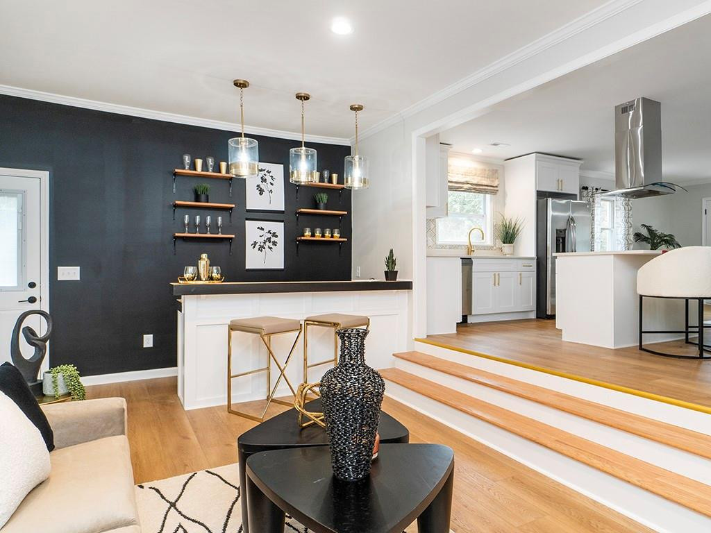 1720 Elder Way Burlington, NC 27215 - Photo 18 of 34 a living room with furniture and kitchen view