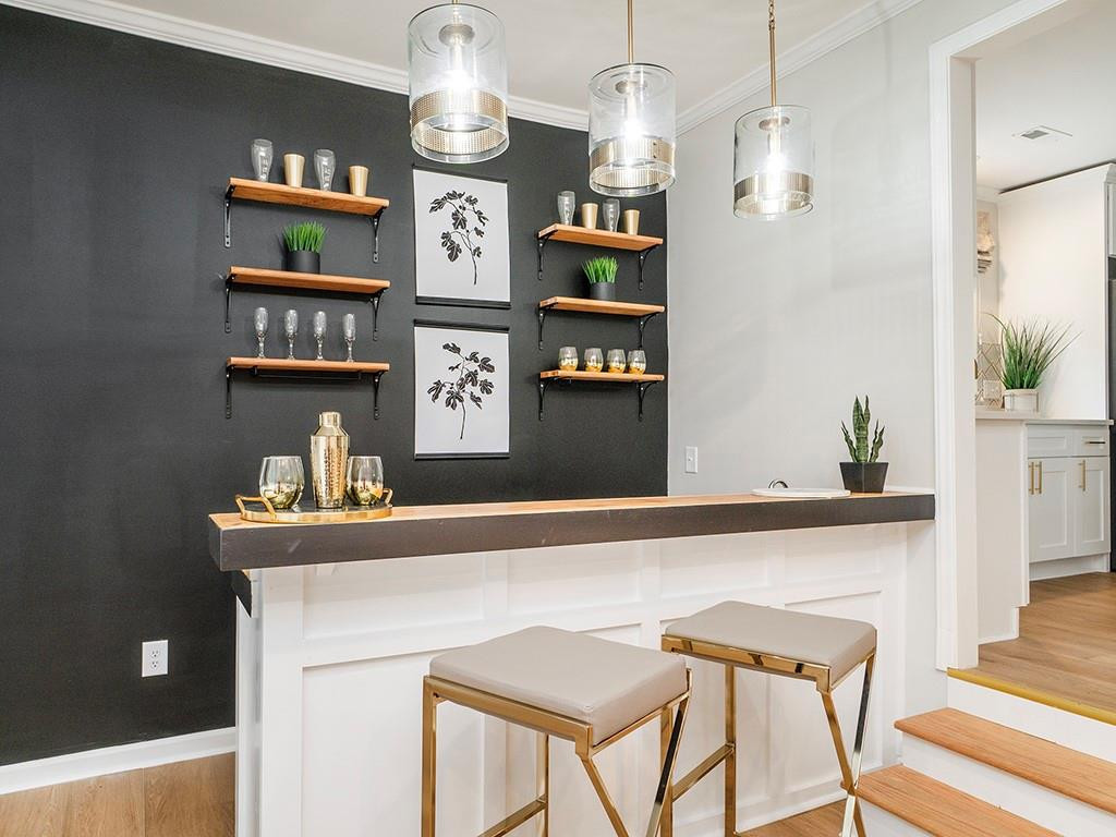 1720 Elder Way Burlington, NC 27215 - Photo 20 of 34 a view of dining room and kitchen with a table chairs