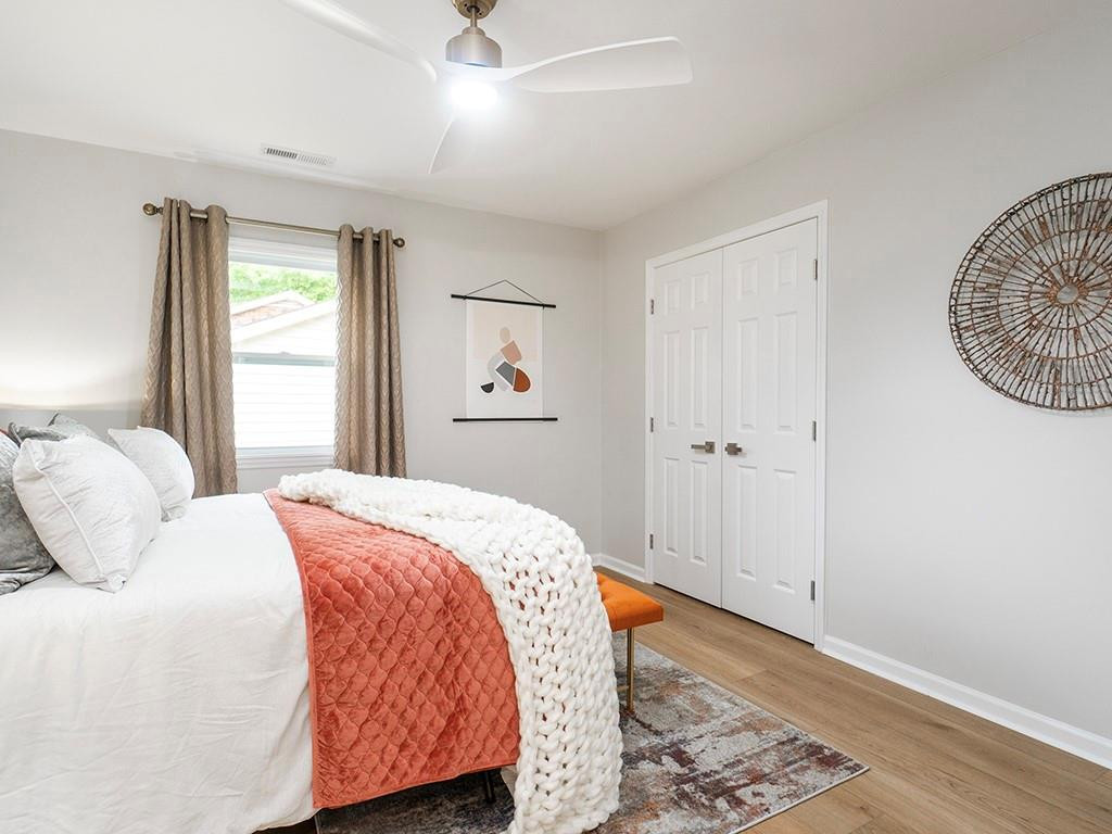 1720 Elder Way Burlington, NC 27215 - Photo 23 of 34 a bedroom with a bed and a window