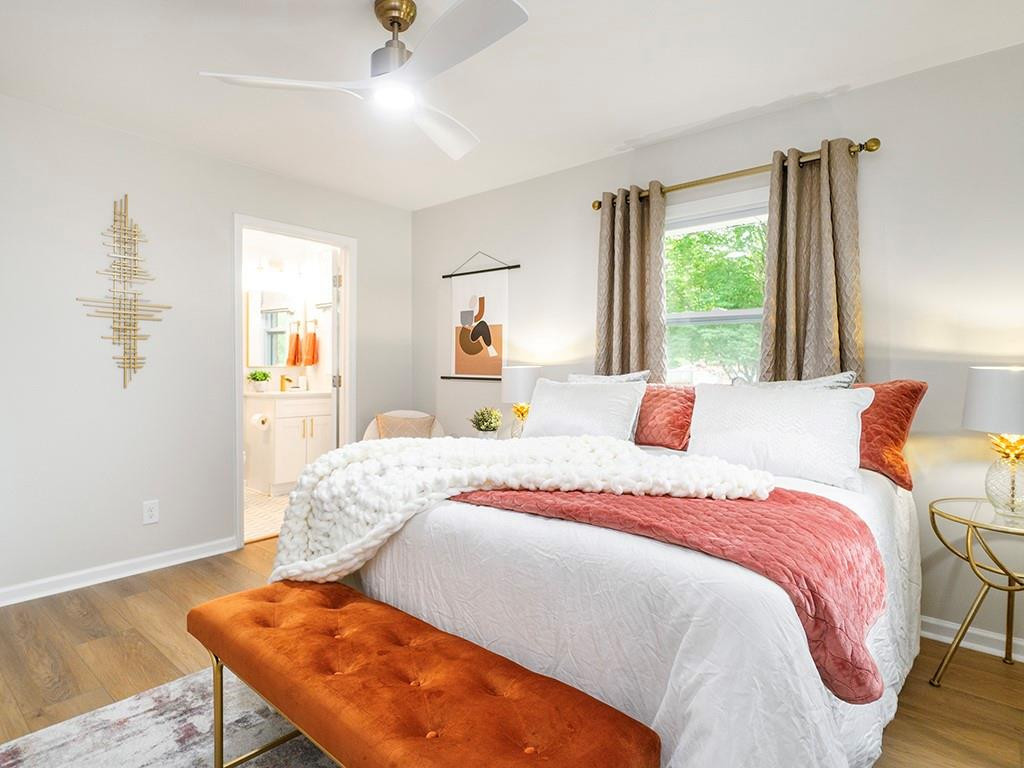 1720 Elder Way Burlington, NC 27215 - Photo 24 of 34 a bedroom with a bed and window