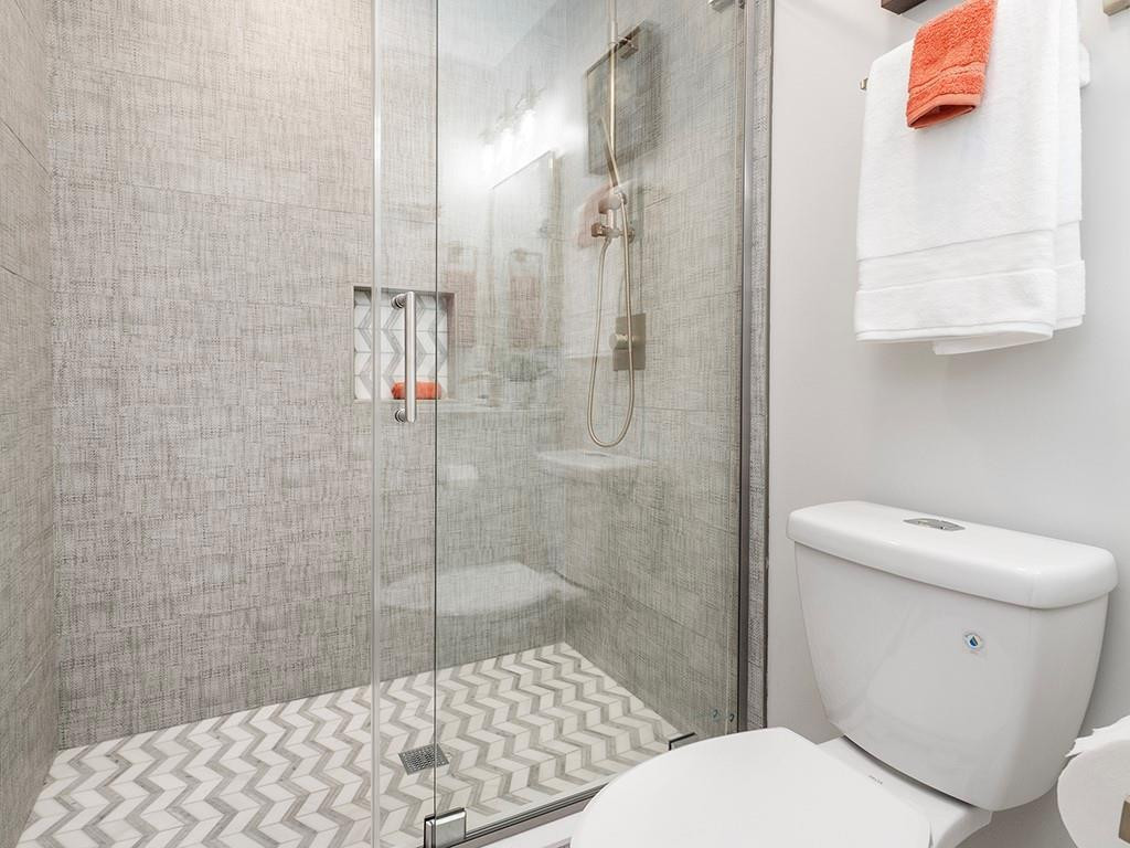 1720 Elder Way Burlington, NC 27215 - Photo 26 of 34 a bathroom with a toilet and a shower