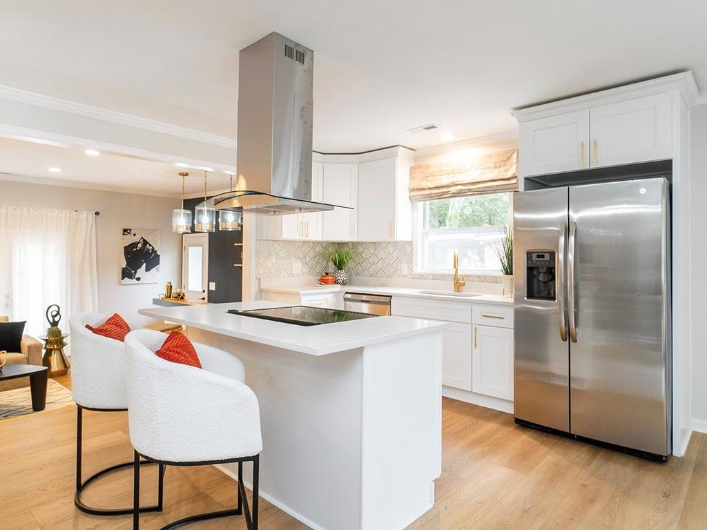 1720 Elder Way Burlington, NC 27215 - Photo 3 of 34 a kitchen with stainless steel appliances a refrigerator and a stove