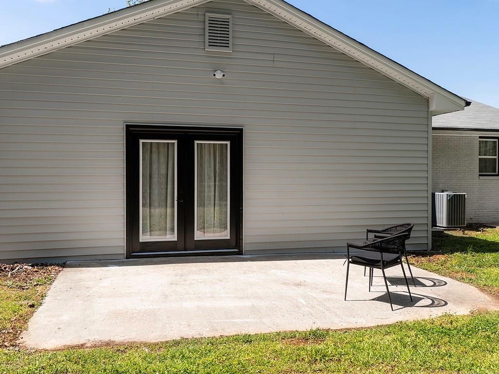 1720 Elder Way Burlington, NC 27215 - Photo 33 of 34 a view of a brick house with a yard
