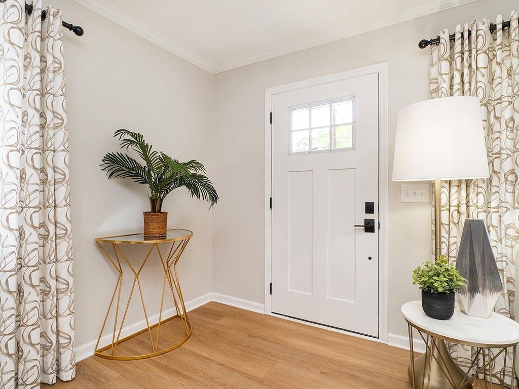 1720 Elder Way Burlington, NC 27215 - Photo 5 of 34 a vase of flowers sitting on a table