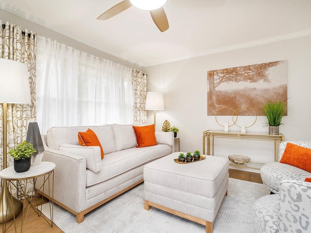 1720 Elder Way Burlington, NC 27215 - Photo 6 of 34 a living room with furniture and a large window