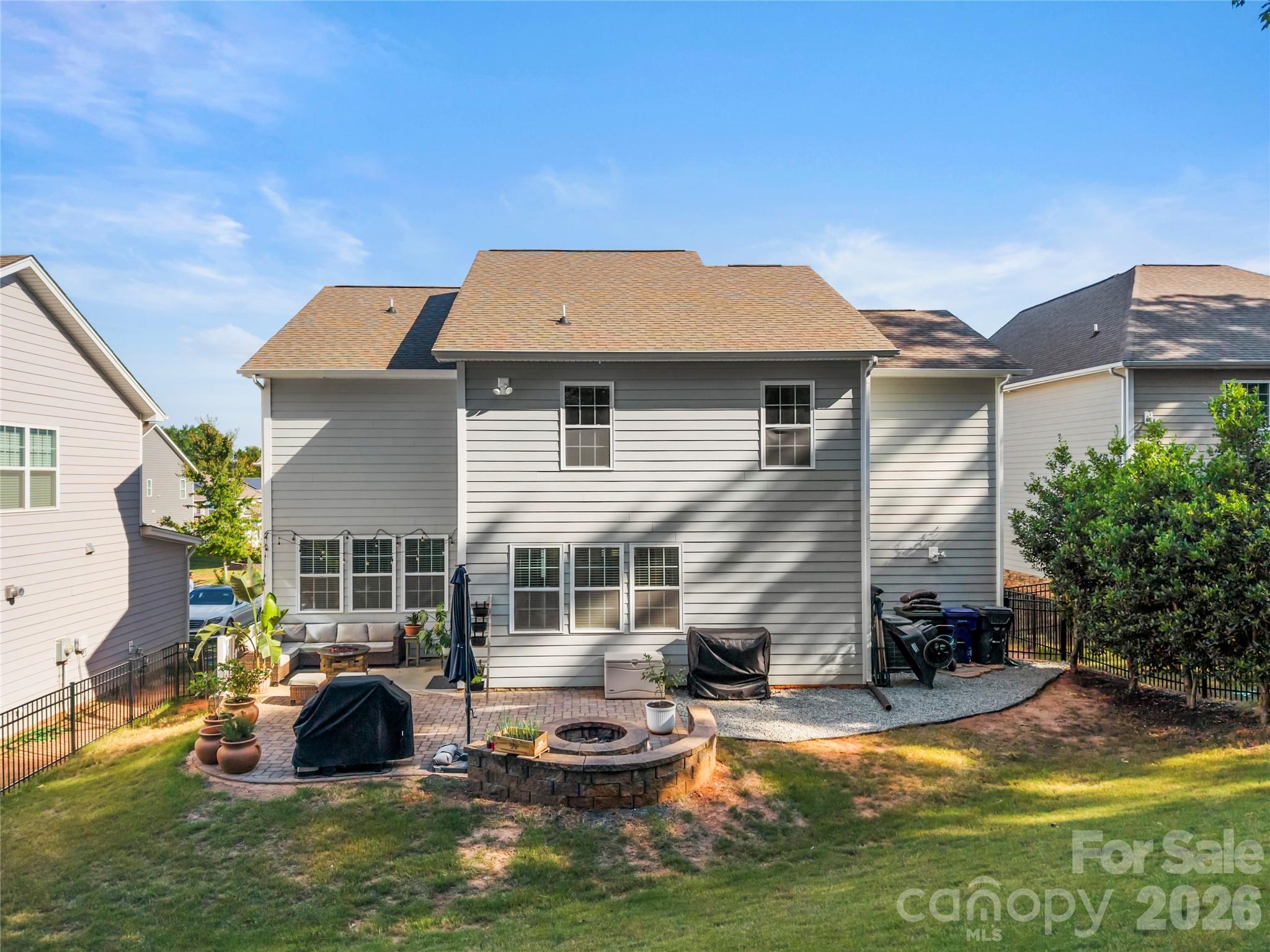 11266 Trailside Road Concord, NC 28027 - Photo 46 of 48 a view of a house with swimming pool