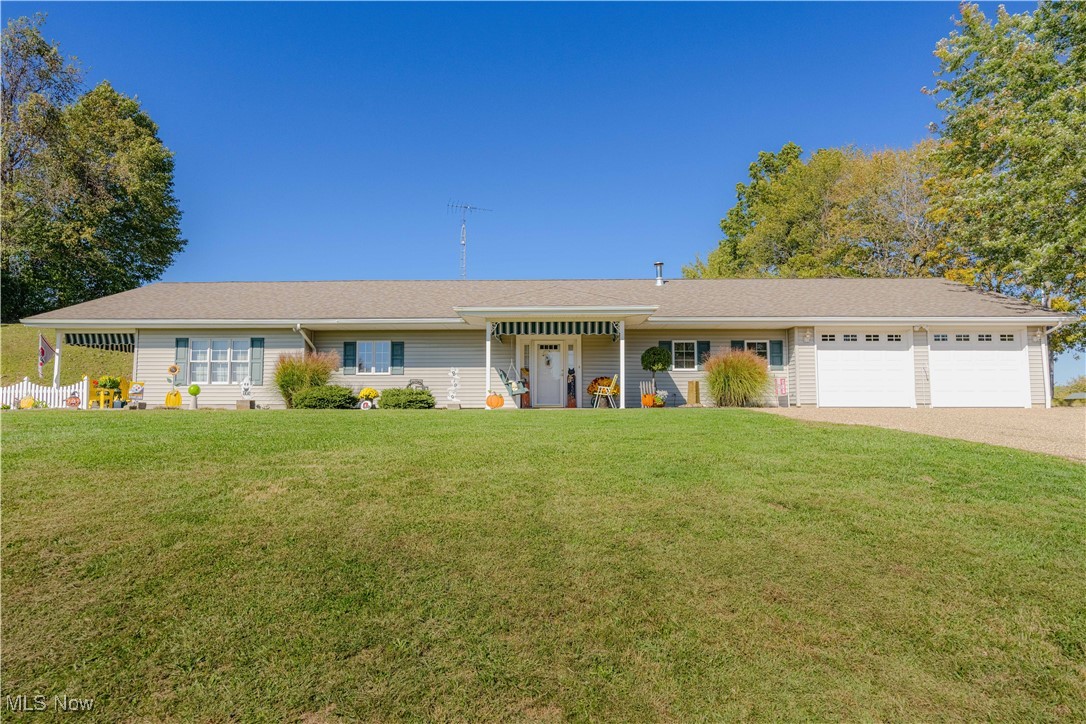 90480 Kilgore Ridge Road Scio, OH 43988 - Photo 1 of 39 Ranch-style house with a front yard, driveway, and an attached garage