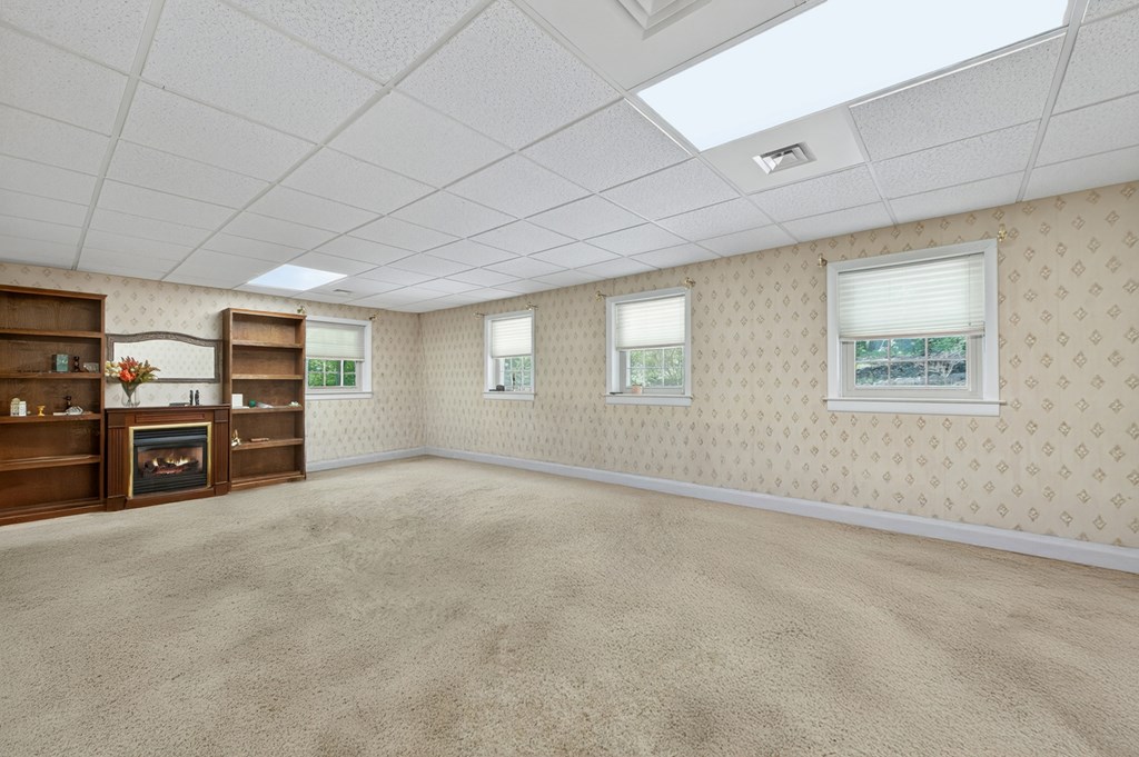 423 Chinquapin Road Ellijay, GA 30536 - Photo 17 of 64 Large living area with electric fireplace