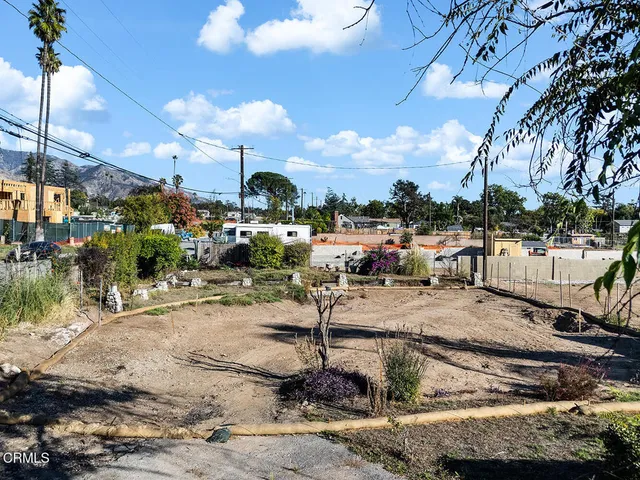 a view of a lake with a yard