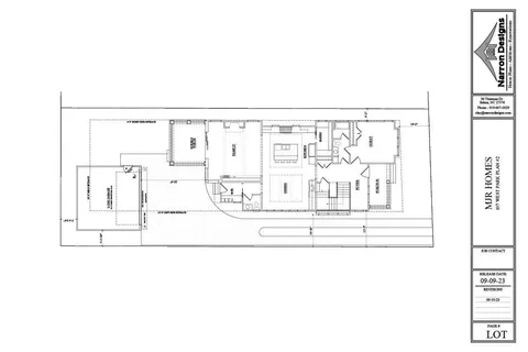 a view of a white building and a clock