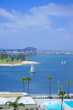 a view of a city with an ocean view